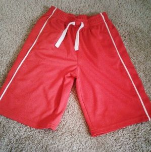 red and white basket ball shorts